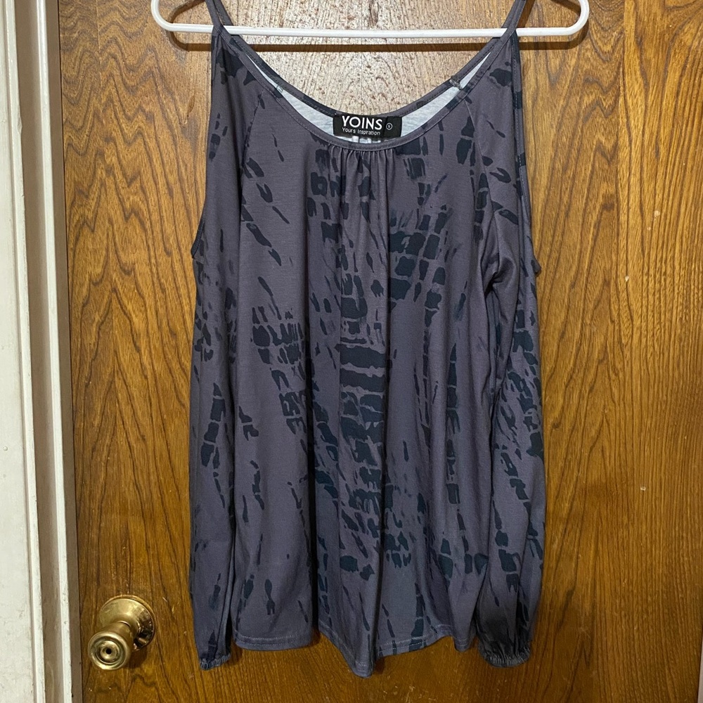 Fun and flirty is what you think when you see this shirt.